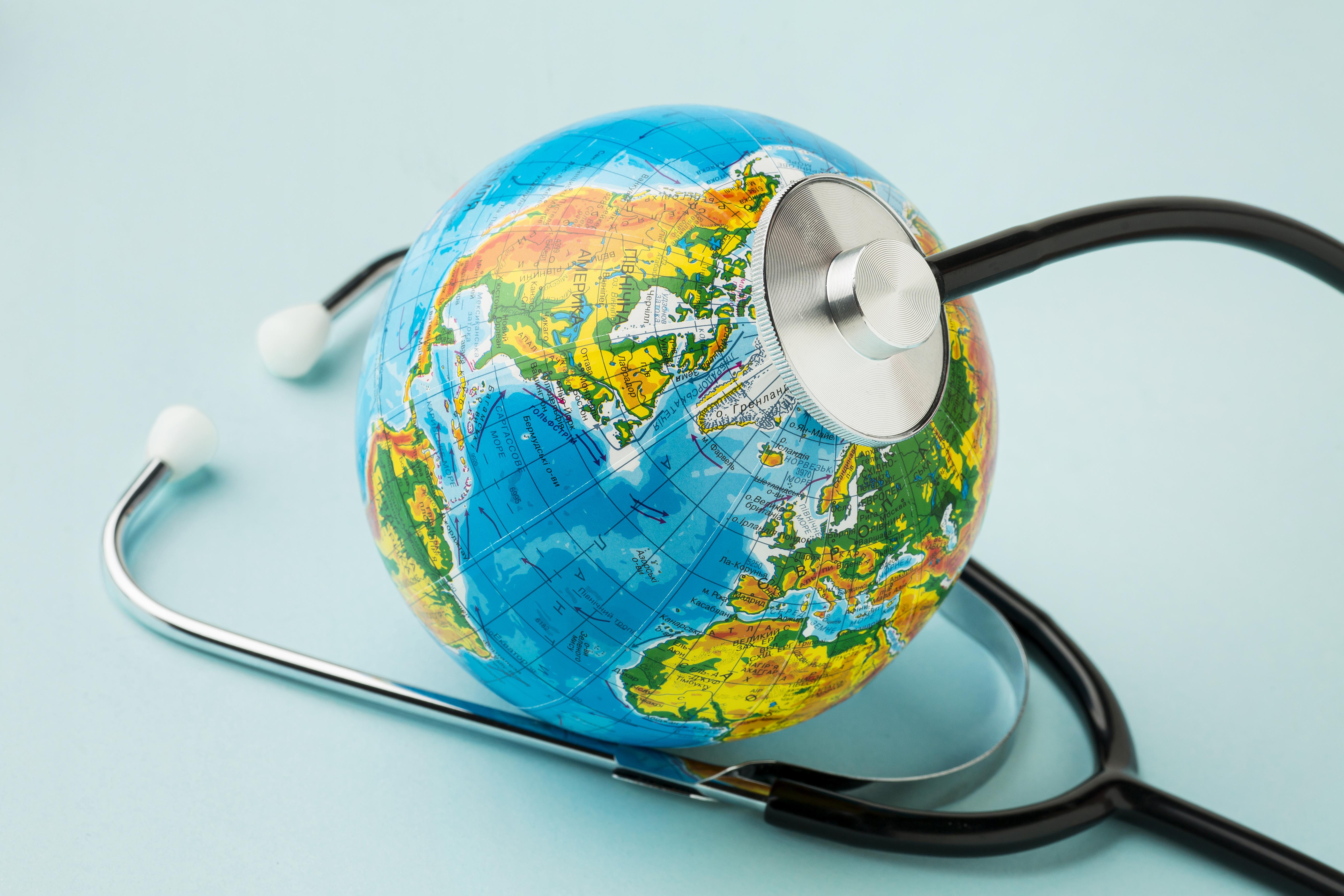 high-angle-globe-with-stethoscope-peace-day.jpg